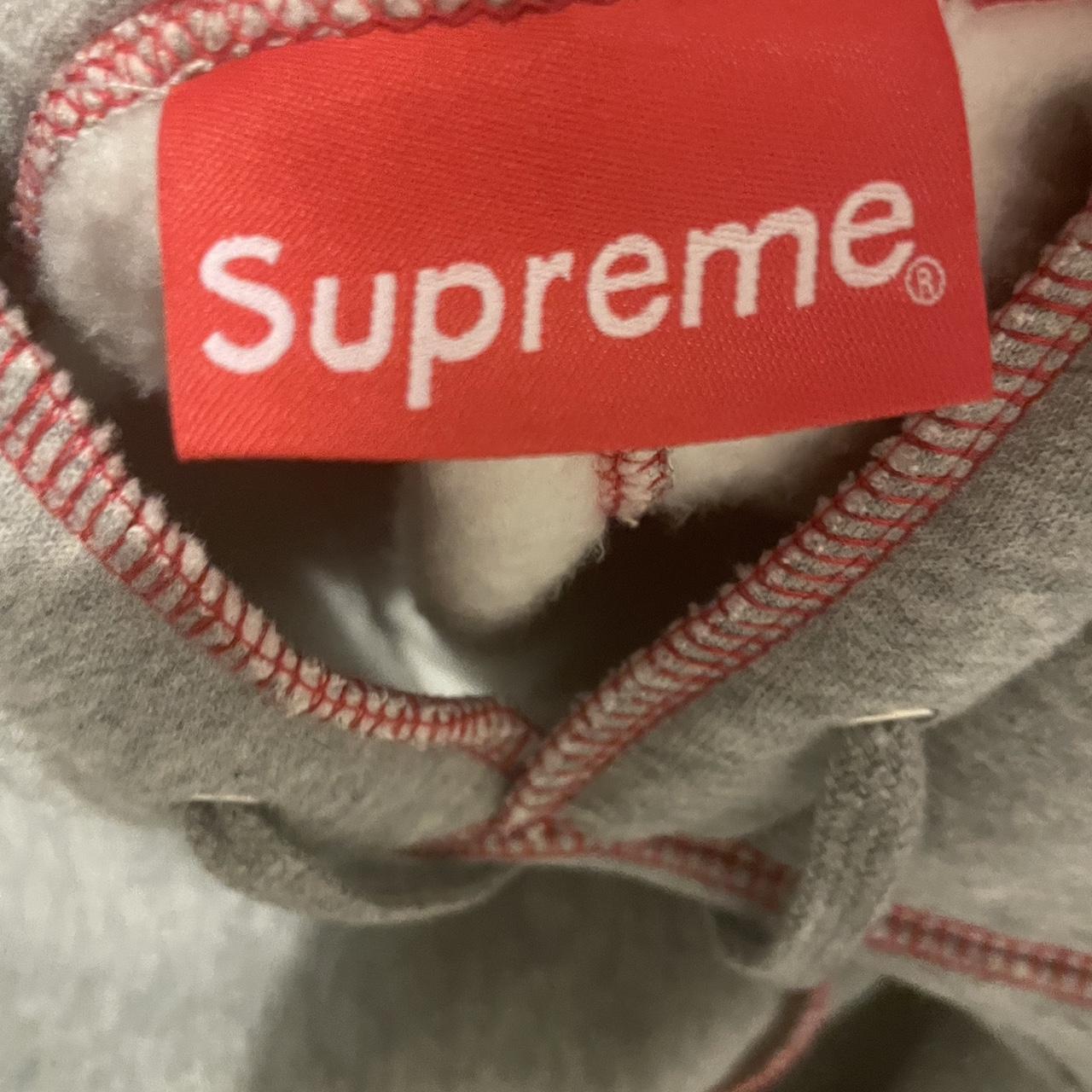 Supreme Iconic Grey Hoodie with Signature Red Logo